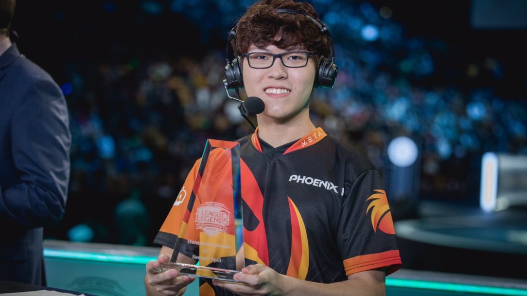 profile of Mike Yeung winning a trophy